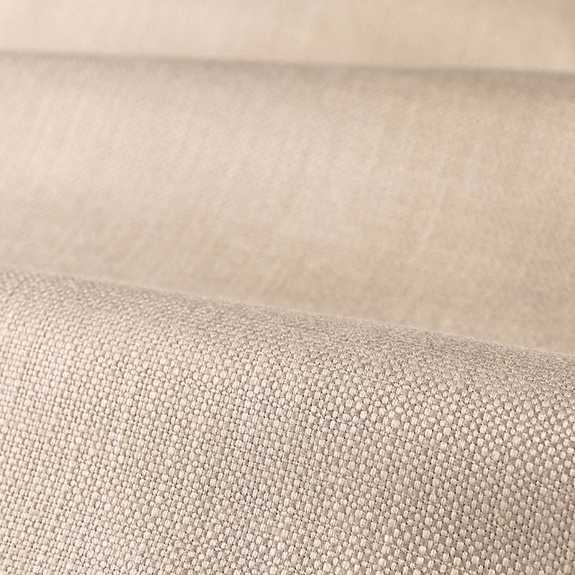 Close-up of warm bisque plain weave showing a fine, even woven grain