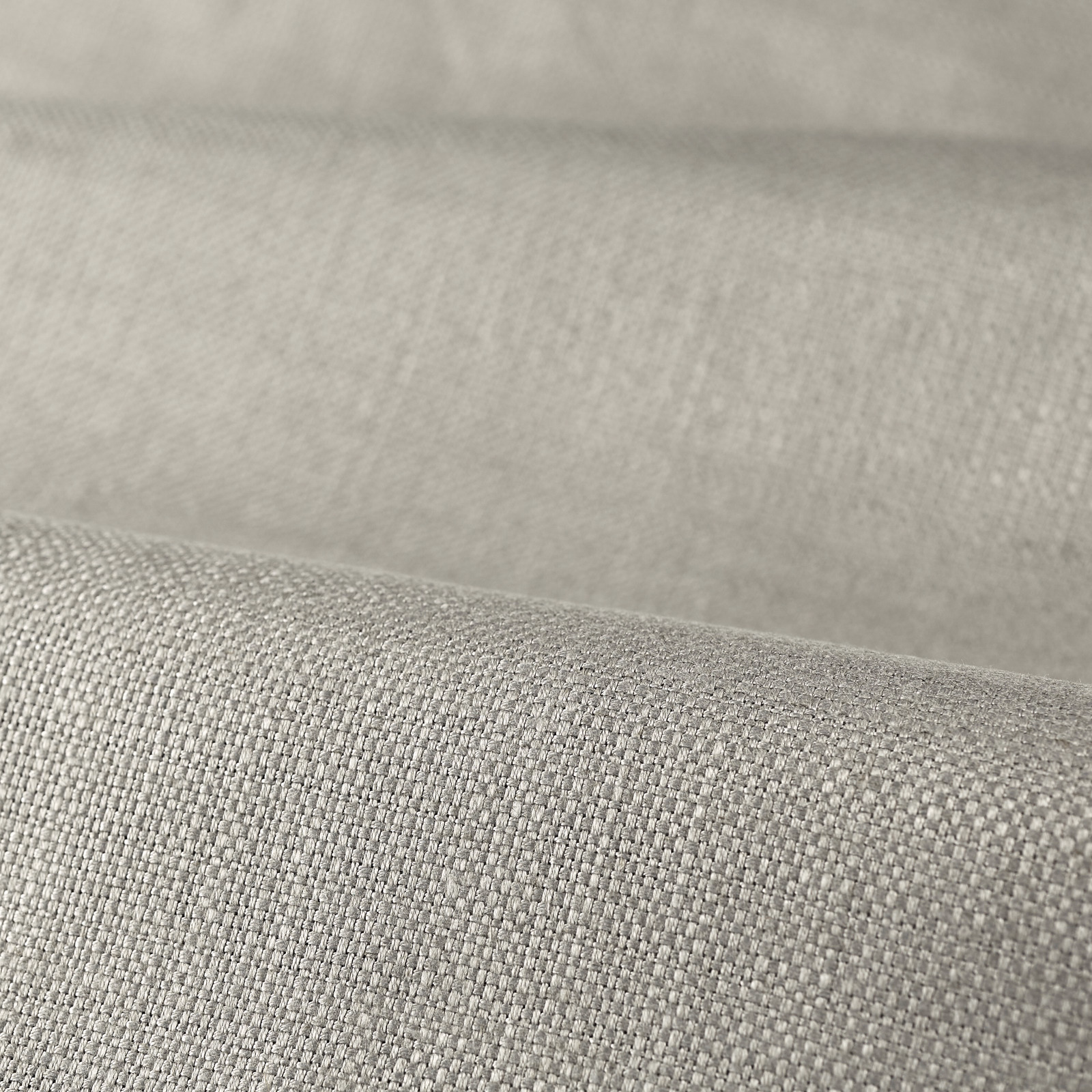Cool silver-grey plain weave showing fine interlacing across a softly folded swatch