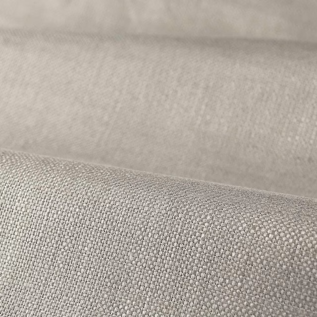 Cool silver-grey plain weave showing fine interlacing across a softly folded swatch