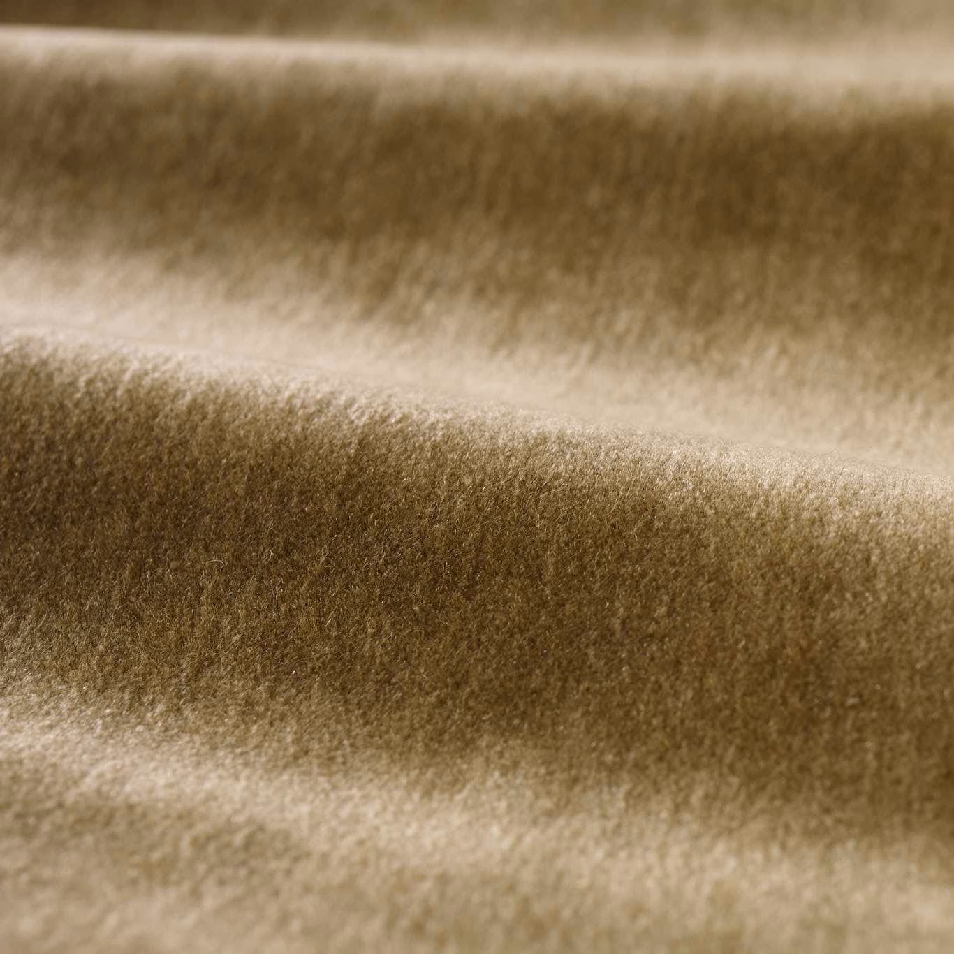 Warm antelope taupe plush velvet showing directional nap across folded swatch