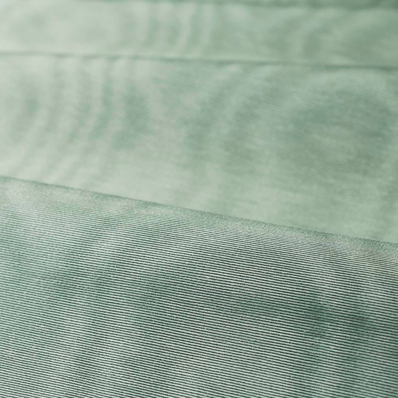 Pale duck egg blue-green moiré with fine horizontal ribbing across a folded swatch