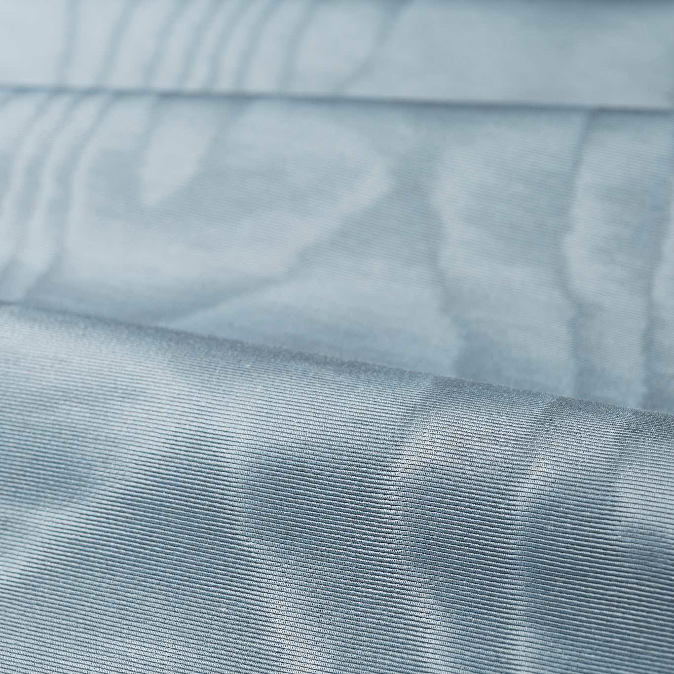 Pale icy blue-grey moiré fabric with fine horizontal ribbing and watery tonal bands