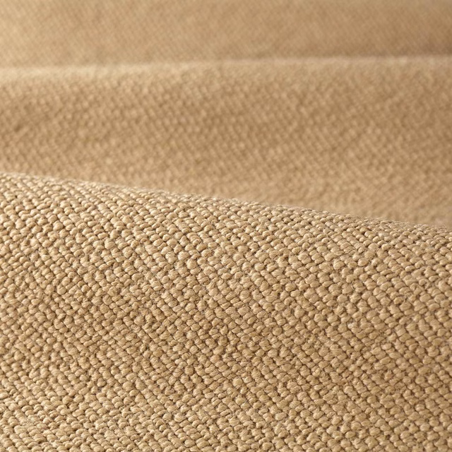 Warm bronze-beige boucle with dense rounded loops and a softly ridged plain surface