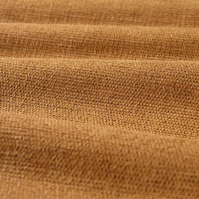 Warm amber-brown chenille weave with a softly raised, granular surface