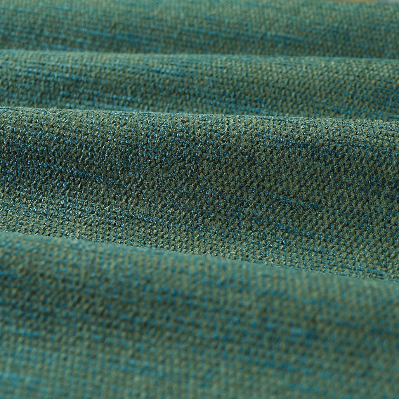 Close-up of deep moss chenille with teal and olive flecks in a tight weave