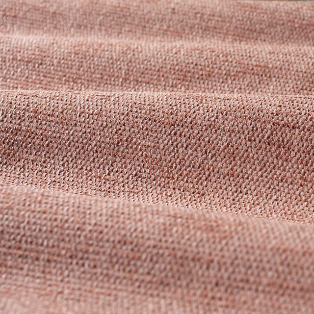 Close-up of dusty Tuscan pink chenille with dense, softly flecked woven texture