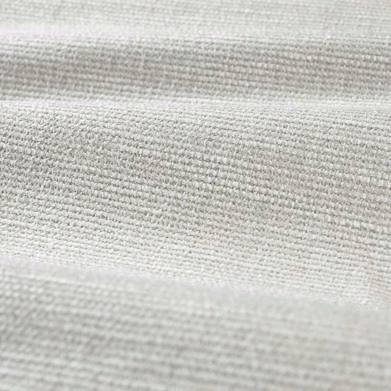 Close-up of pale cool-grey chenille showing a dense, softly nubby horizontal weave