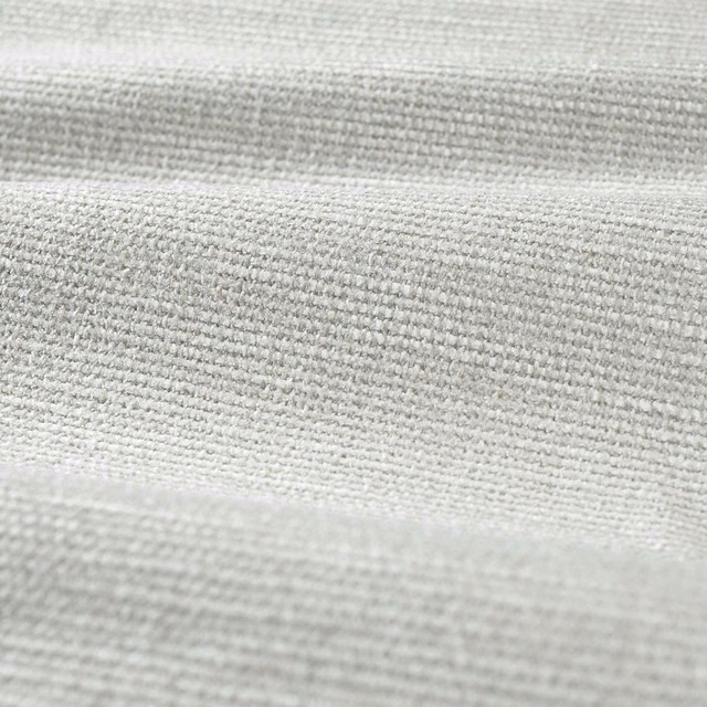 Close-up of pale cool-grey chenille showing a dense, softly nubby horizontal weave