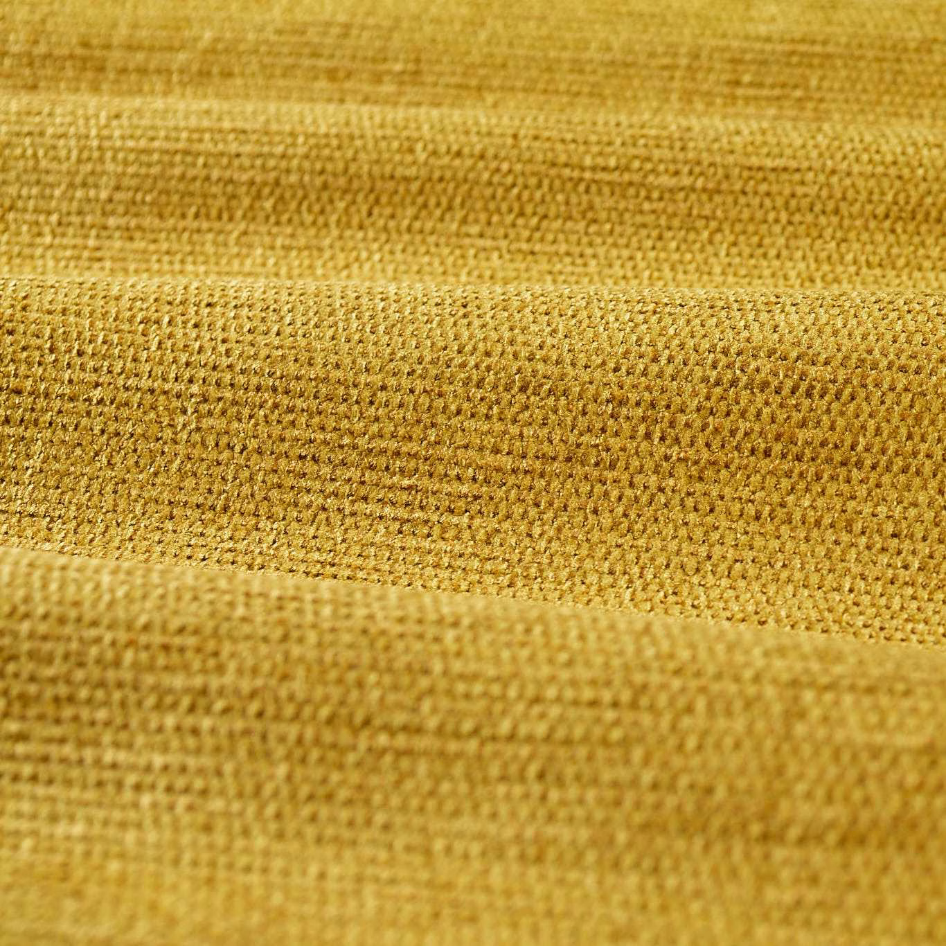 Close-up of warm Tigers Eye gold chenille with dense nubby woven texture