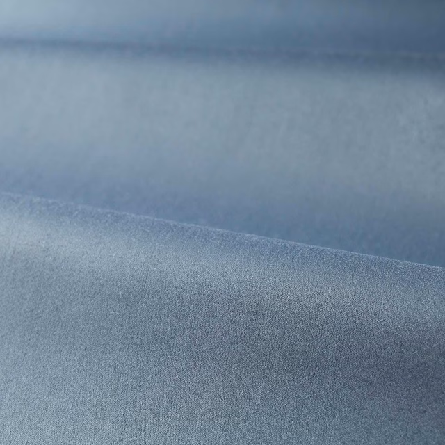 Blue-grey satin fabric with a cool slate tone and gentle sheen