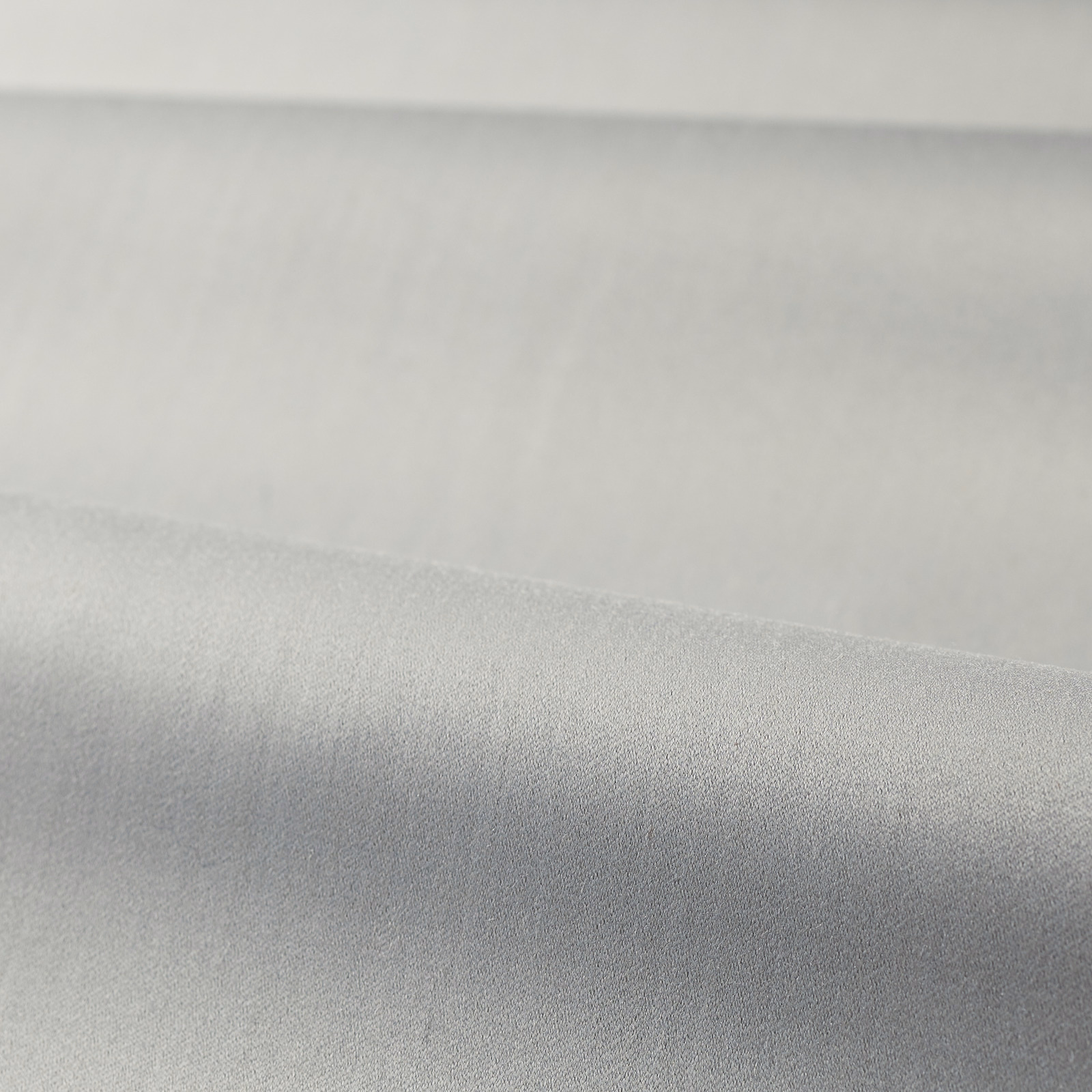 Cool platinum grey plain satin textile with a softly reflective surface