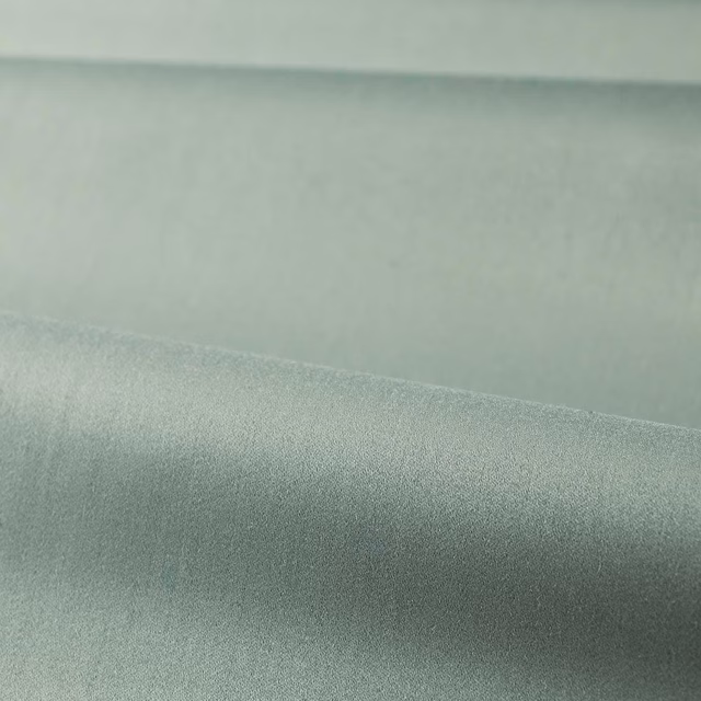 Muted Stockholm blue-grey satin fabric with a smooth surface and soft silvery sheen