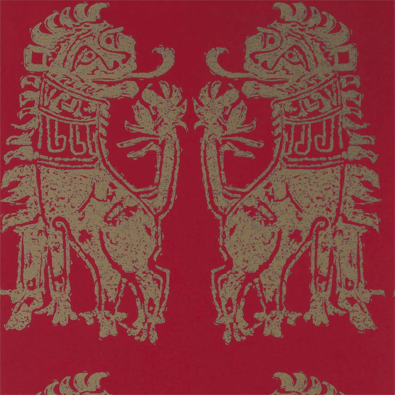 Mirrored distressed bronze lions on a saturated cinnabar red wallpaper ground