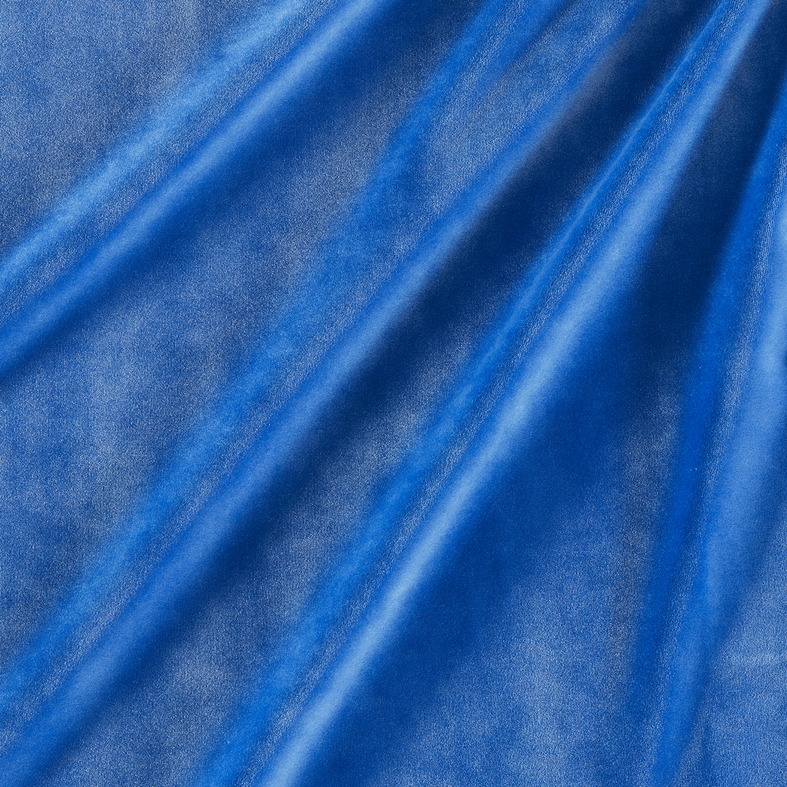Cobalt blue velvet close-up showing directional sheen across softly folded pile
