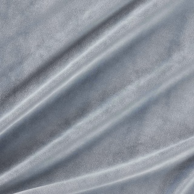 Cool quartz grey velvet with silvery highlights and soft diagonal folds