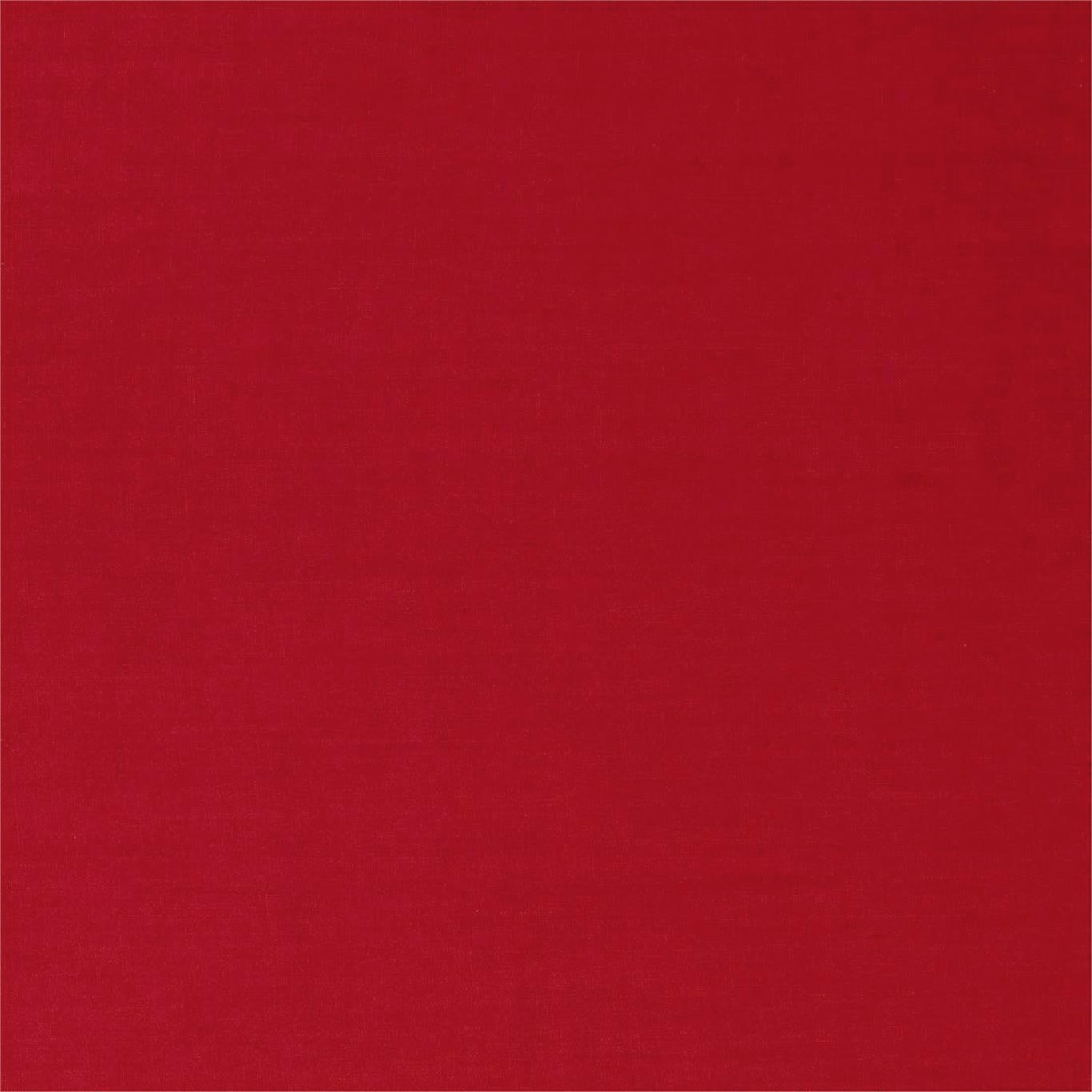 Close-up of deep crimson plain fabric with a subtle, tightly woven texture