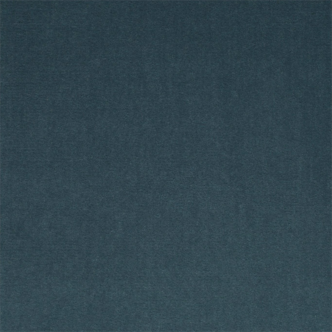 Close-up of deep blue-green teal velvet with softly mottled directional nap