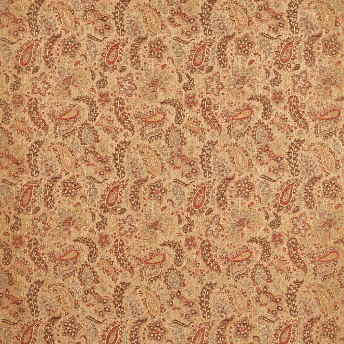 Antique gold paisley fabric with russet floral motifs and softly textured woven surface