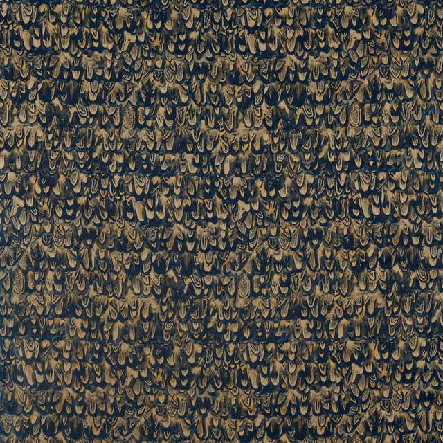 Dense ink-blue textile with ochre feather-like motifs and softly raised woven texture