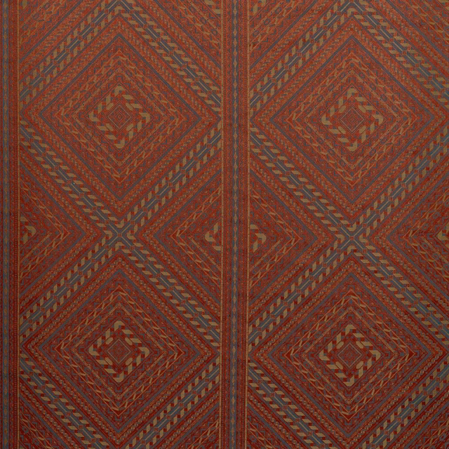 Deep Venetian red trellis weave with charcoal, ochre and blue-grey diamond details