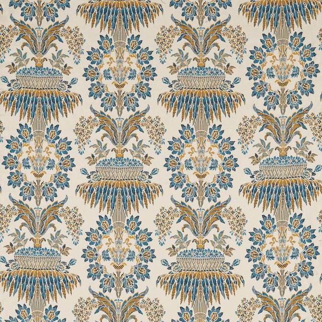Teal and gold floral urn motifs woven across a cream ground