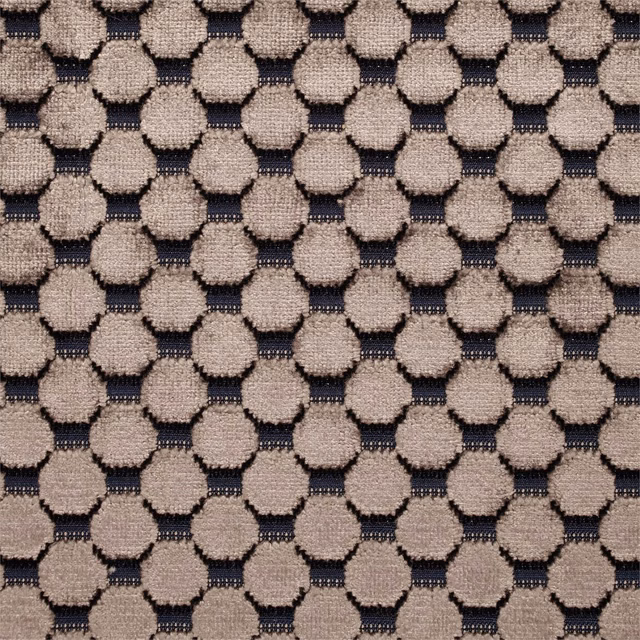 Raised taupe spot motifs over a dark indigo velvet ground