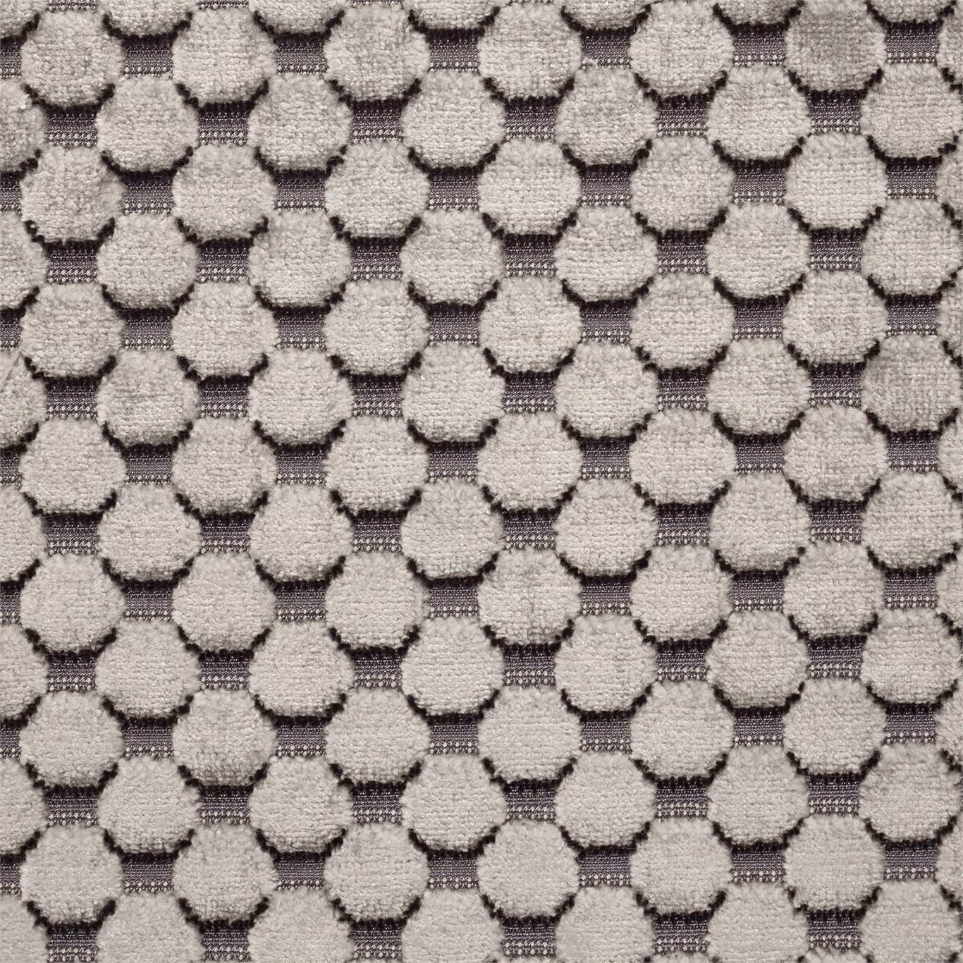 Cool silver-grey raised spots over a dark pewter geometric velvet ground