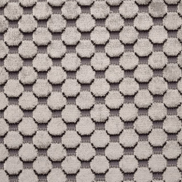 Cool silver-grey raised spots over a dark pewter geometric velvet ground