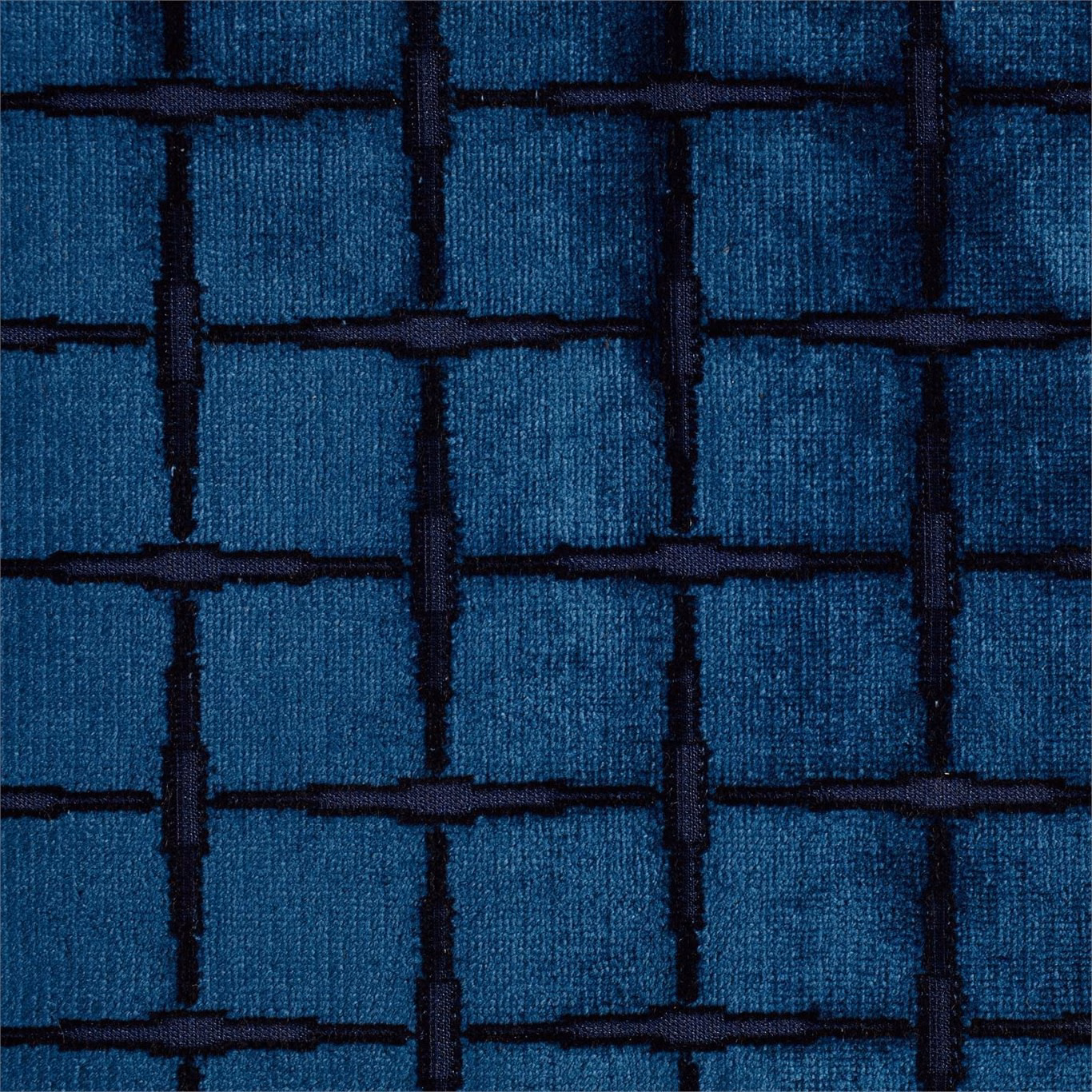 Deep indigo velvet with black geometric grid and softly reflective vertical pile