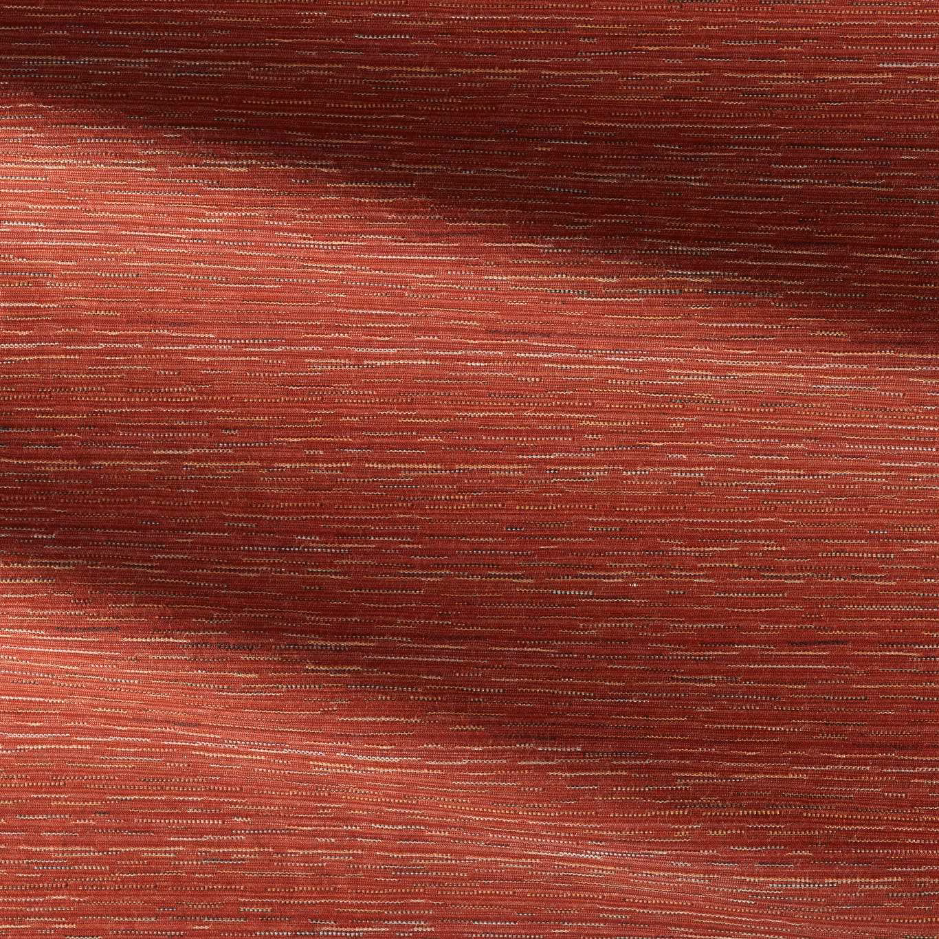 Close-up of richly textured russet red fabric with fine horizontal woven lines and darker burgundy shading