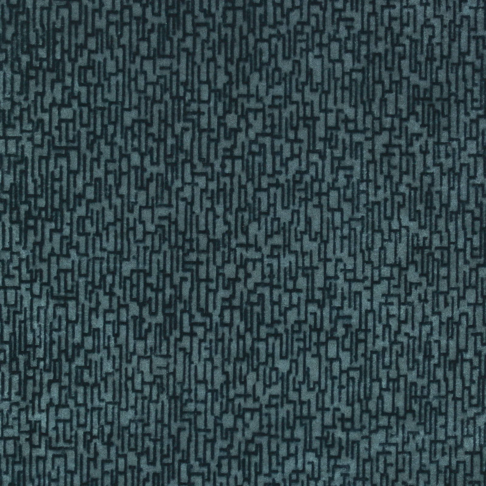 Deep blue-teal woven fabric with a dense charcoal maze-like linear pattern