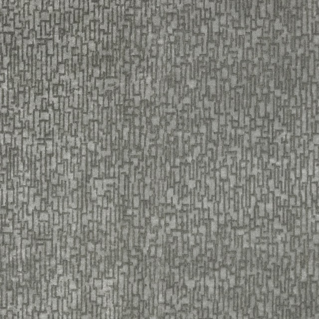 Cool silver-grey woven textile with a small broken rectangular geometric pattern