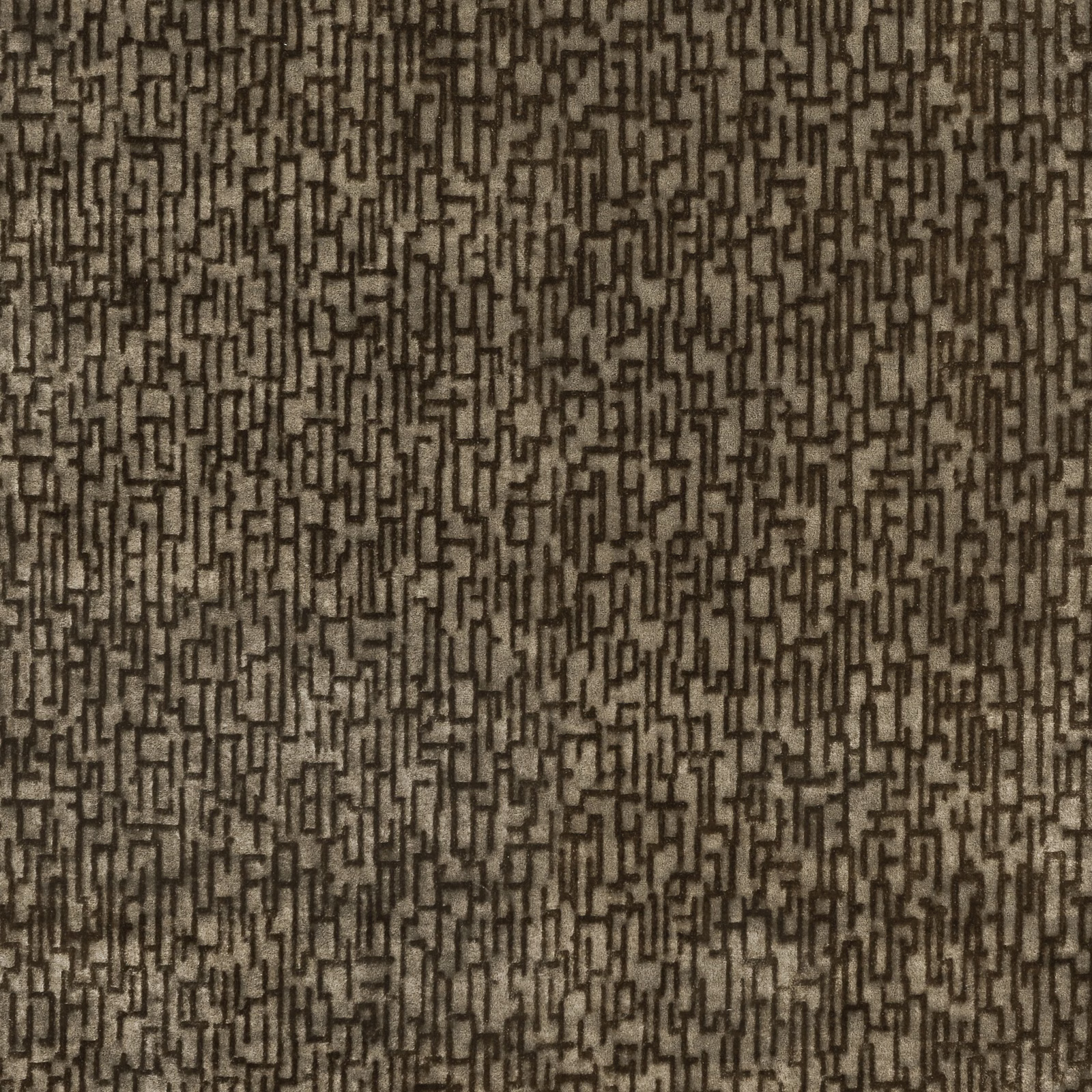 Warm taupe-brown woven fabric with dense charcoal maze-like geometric lines