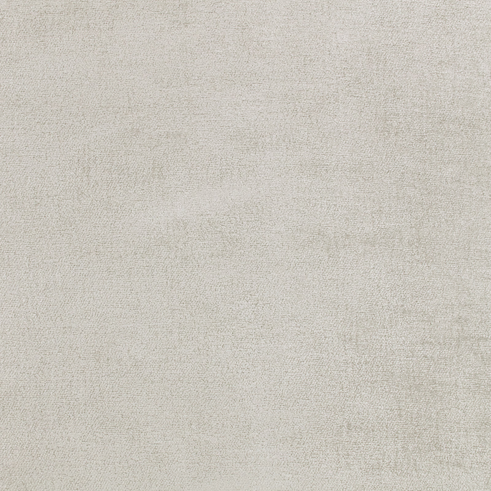 Pale silver-grey textile with fine mottled grain and soft tonal variation