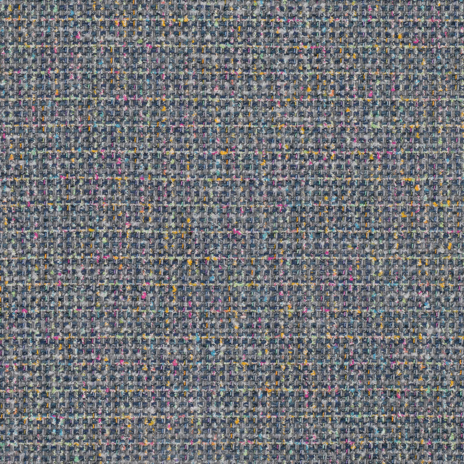Close-up of blue-grey woven fabric with pink, ochre and cream flecks