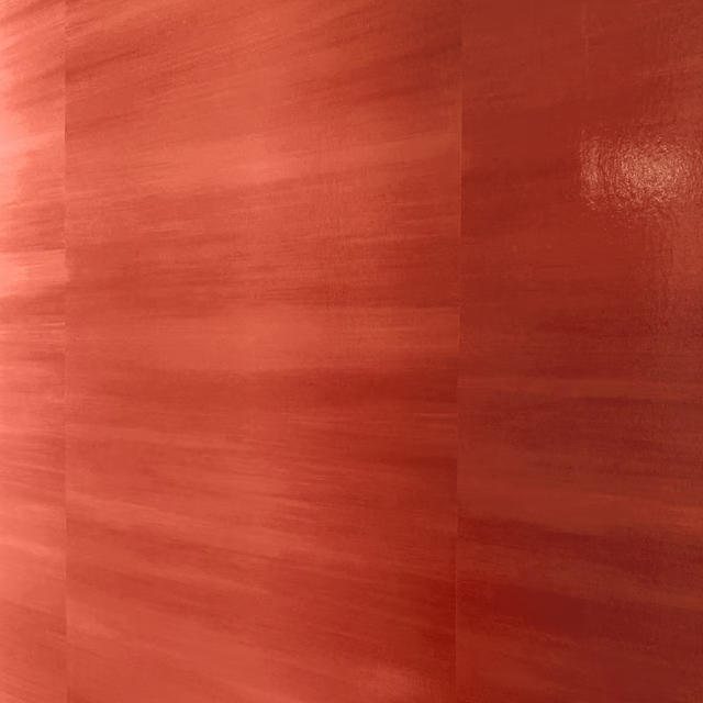 Red-coral lacquer wallcovering with brushed horizontal grain and glossy panelled sheen