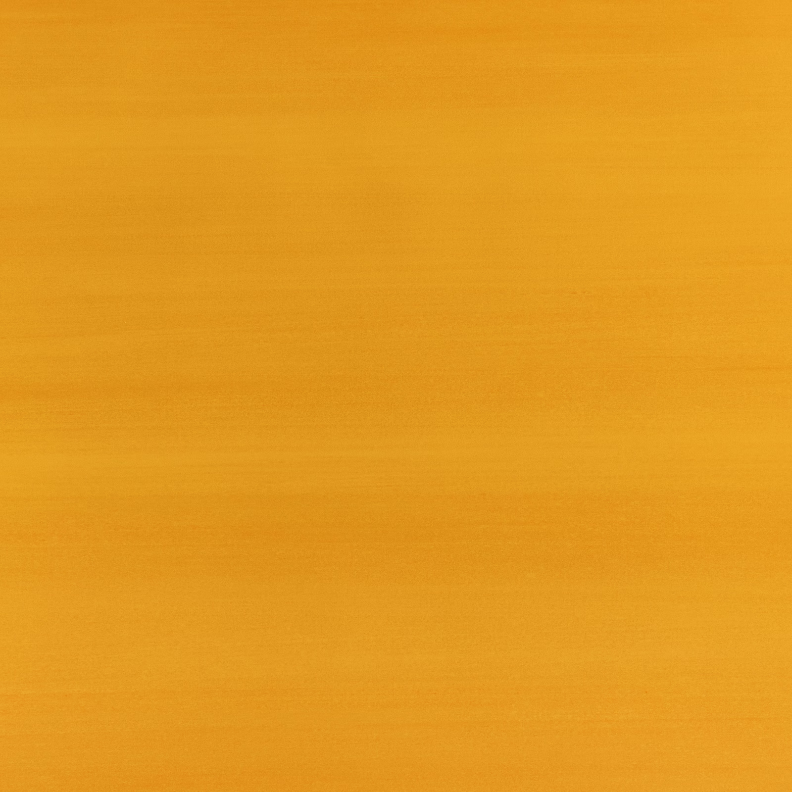 Warm ochre wallpaper with subtle horizontal striations and softly varied surface