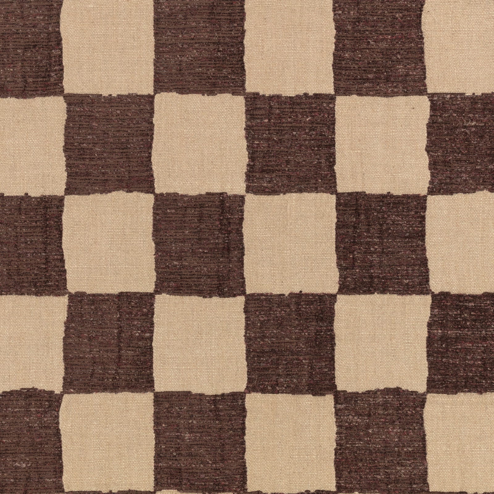 Deep plum-brown and cream checks with a coarse, irregular woven texture