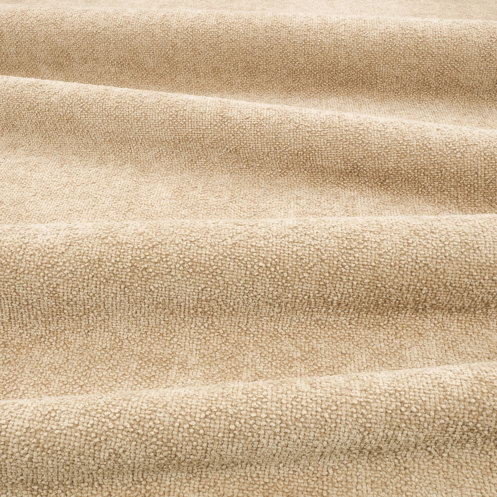 Warm oatmeal-beige nubby textile shown in softly folded horizontal bands