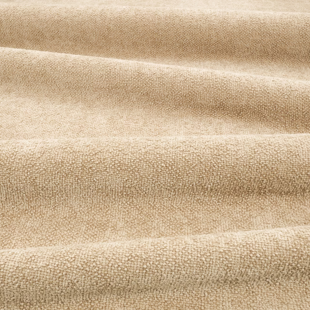 Warm oatmeal-beige nubby textile shown in softly folded horizontal bands