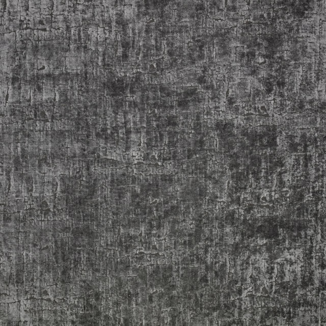 Dark gunmetal grey textile with distressed crosshatch texture and charcoal variation