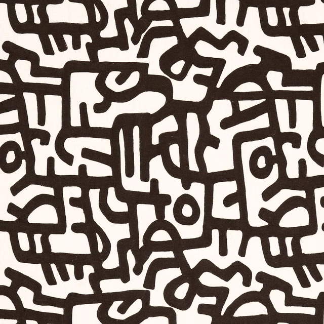 Ivory fabric with bold dark brown, interlocking abstract linework