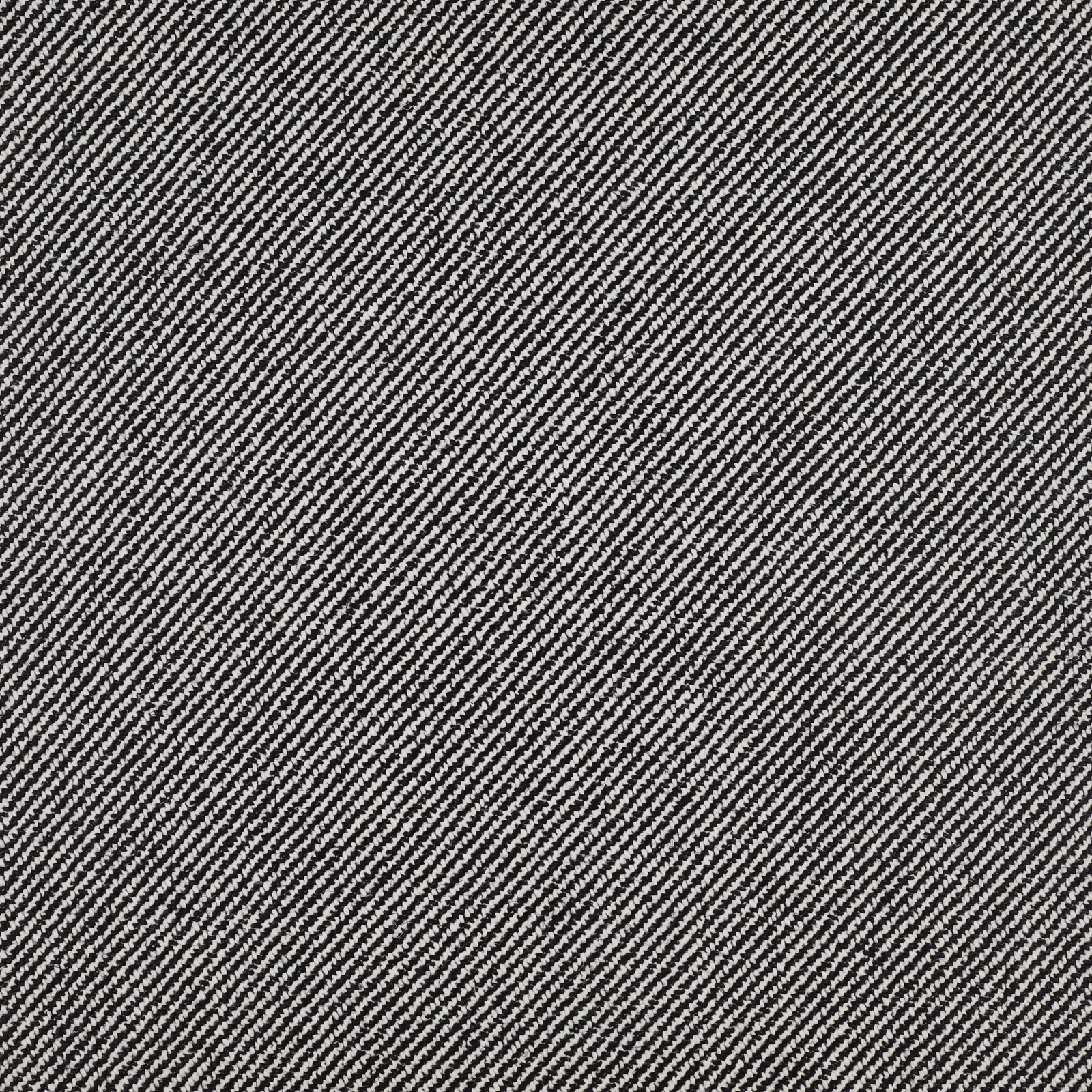 Close-up of charcoal and ivory fabric with a fine diagonal twill weave