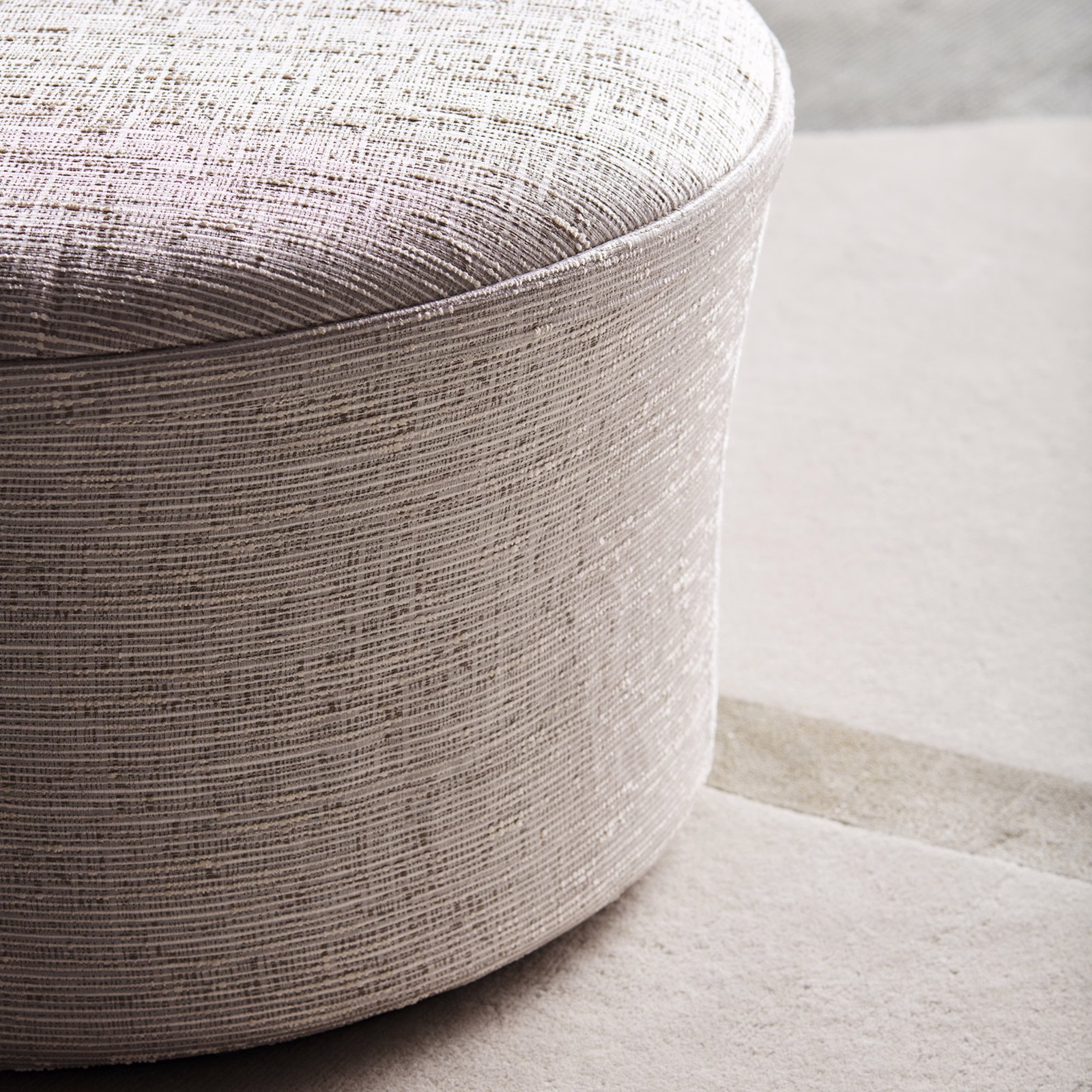 Pale taupe-grey woven fabric with fine horizontal ribs and a subtle sheen