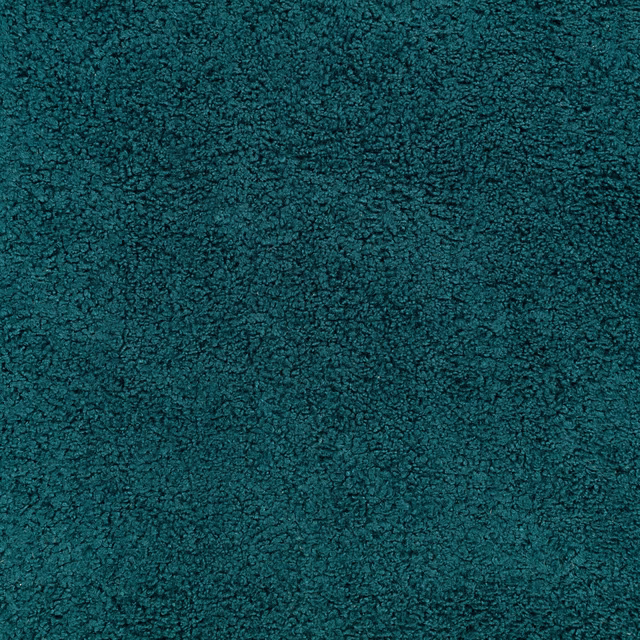Close-up of Drake Electric Teal's dense nubby weave in saturated blue-green