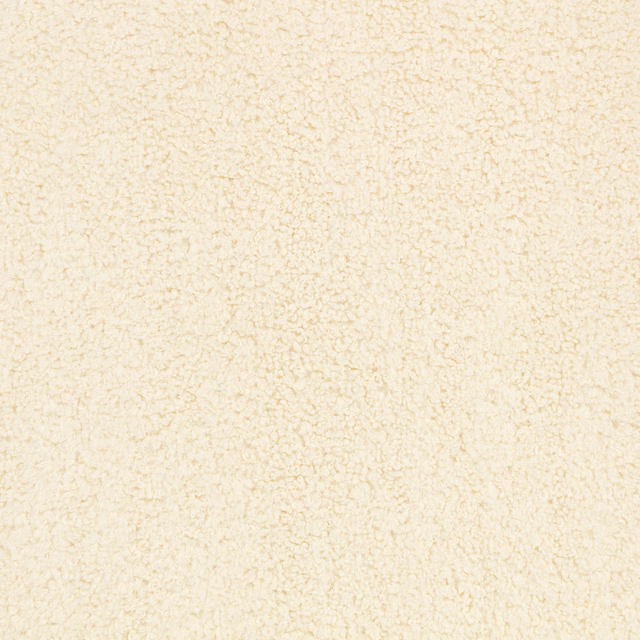 Warm ivory cream fabric with irregular nubby boucle-like texture and beige flecks