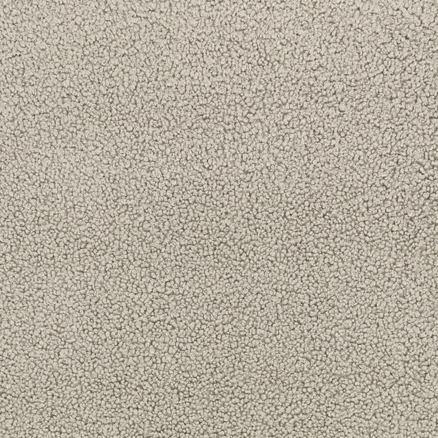 Close view of cool silver-grey fabric with dense irregular looped texture