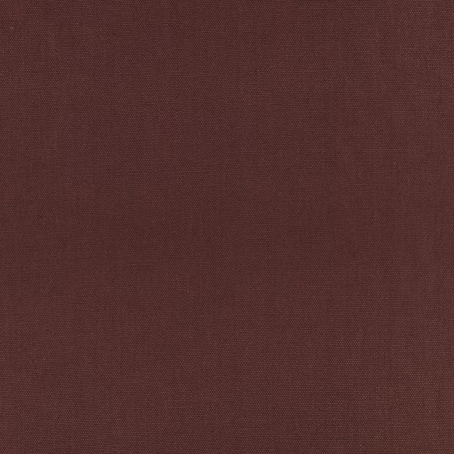 Close view of muted eggplant-brown plain weave with subtle red warmth