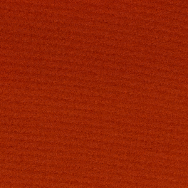 Close-up of deep rust-orange outdoor upholstery with a fine horizontal woven texture