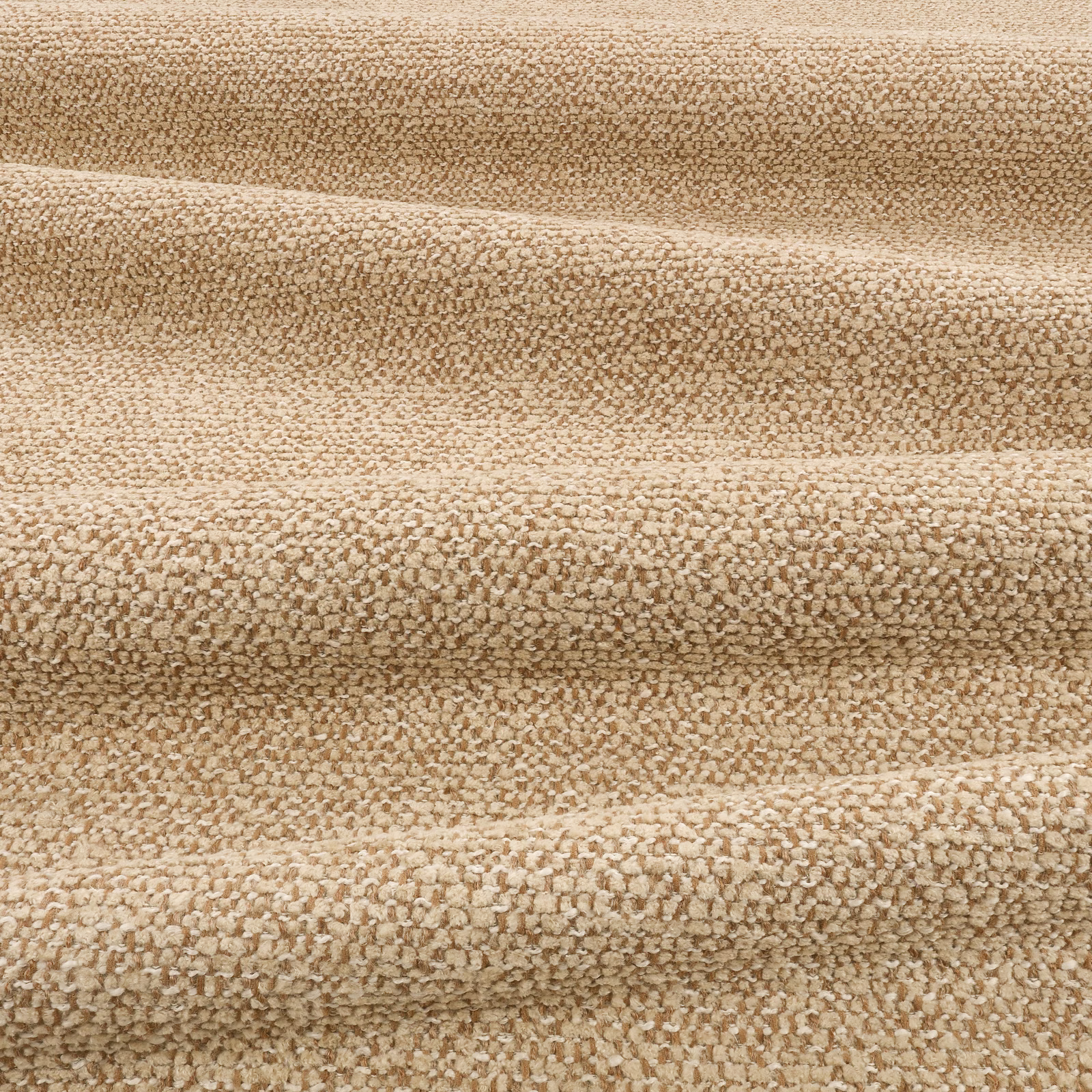 Warm camel-beige nubby textile with cream flecks and softly folded ridges